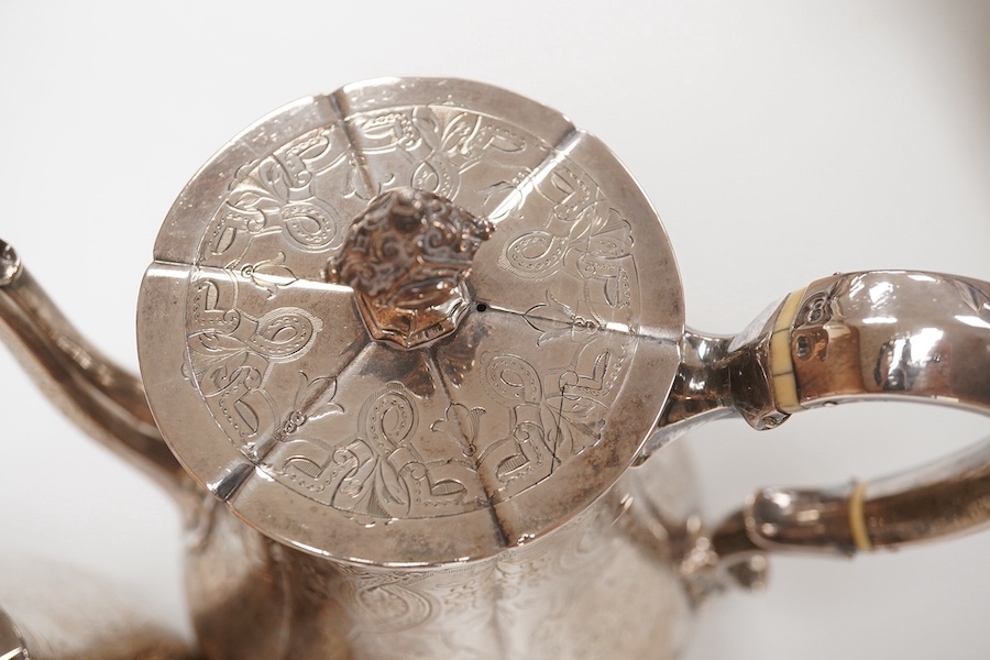 A Victorian engraved silver teapot and matching coffee pot, by George Ivory, London, 1857, gross weight 46.2oz. CITES Submission reference 4K2AZFRW. Condition - fair to good